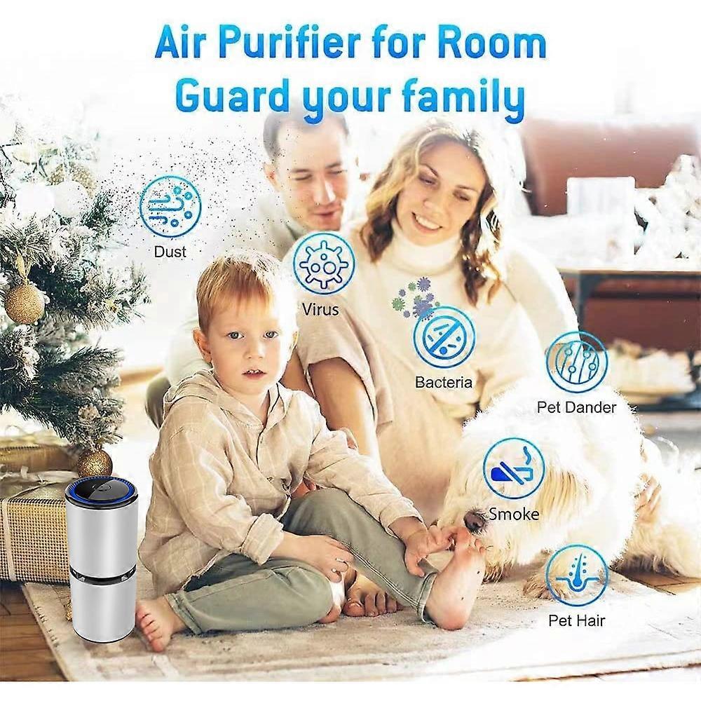 Compact portable air purifier standing on a bedside table