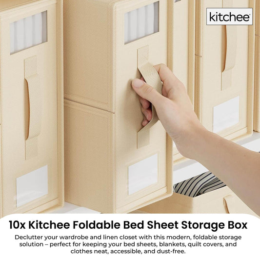 Beige foldable linen storage boxes with pull handles stacked in a wardrobe