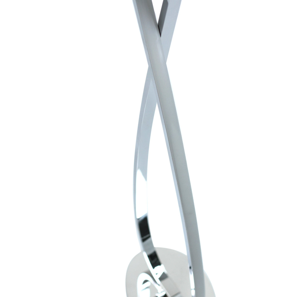 Slim chrome LED floor lamp standing in a living room corner