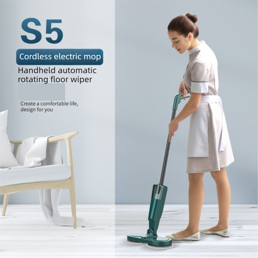 Green cordless electric spin mop with dual rotating heads on a tiled floor