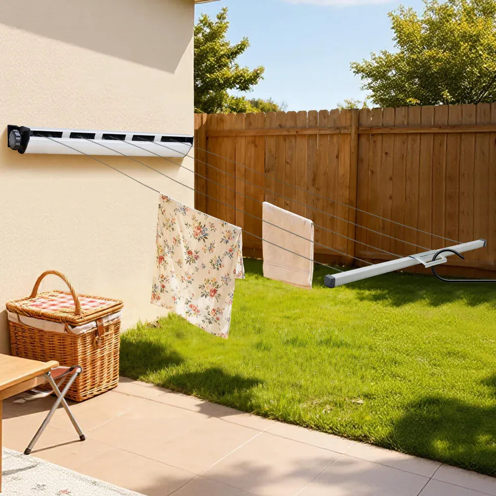 White wall-mounted retractable clothesline with five lines and housing