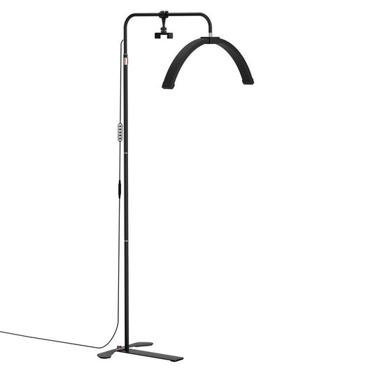 Half moon LED beauty light on a stand with detachable phone holder
