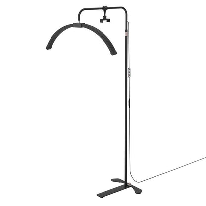 Half moon LED beauty light on a stand with detachable phone holder