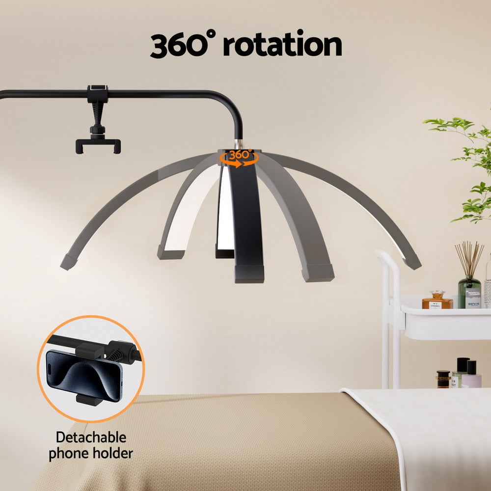 Half moon LED beauty light on a stand with detachable phone holder