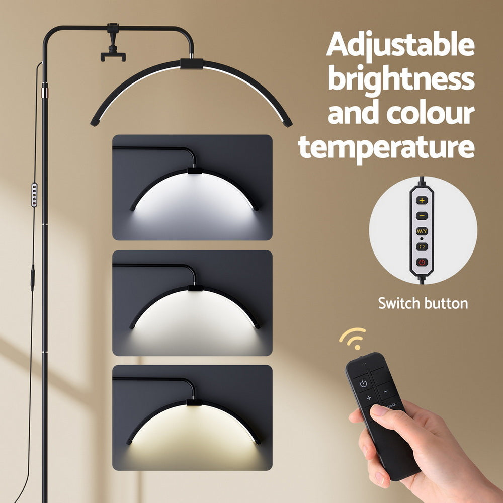 Half moon LED beauty light on a stand with detachable phone holder