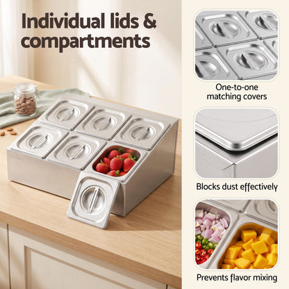 Stainless steel six pan food display container with lids on a bench