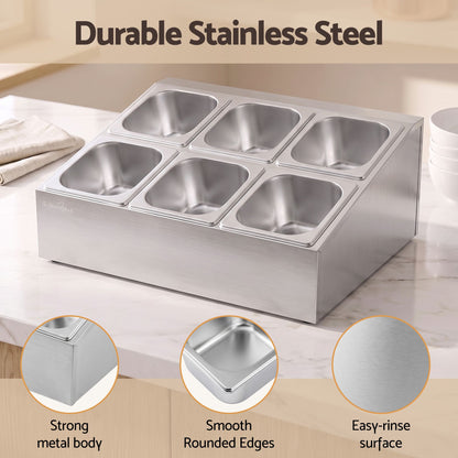 Stainless steel six pan food display container with lids on a bench