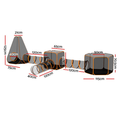Folding six-in-one pet playpen with tunnel and mesh panels set up on grass