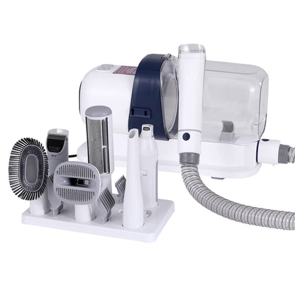 White 7-in-1 pet grooming kit with vacuum and comb attachments