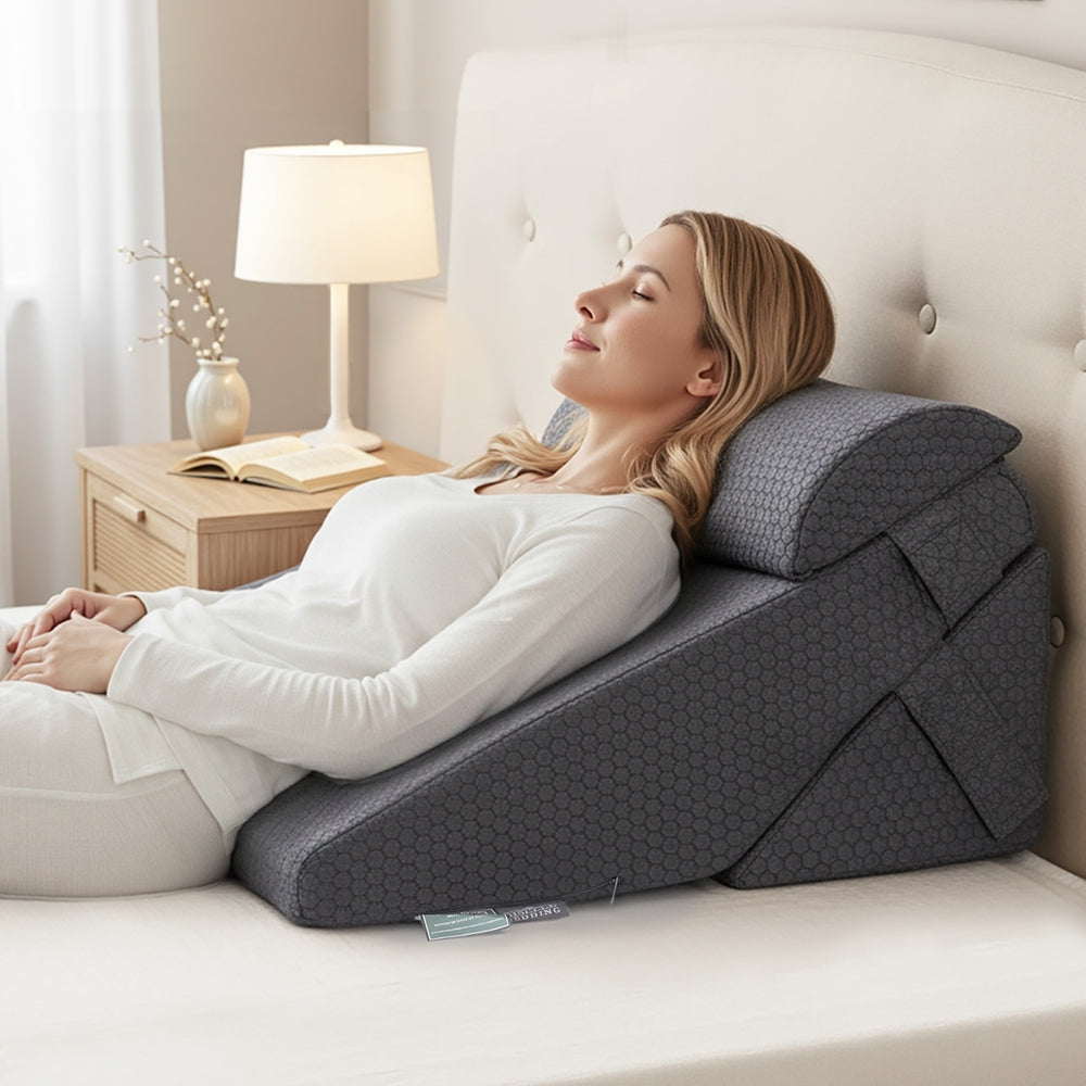 Grey adjustable wedge pillow with layered foam design and jacquard cover
