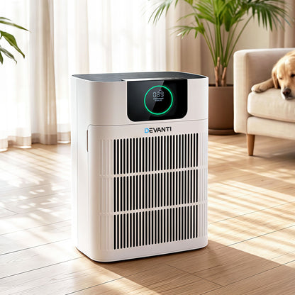 White pet air purifier with PM2.5 display standing in a living room