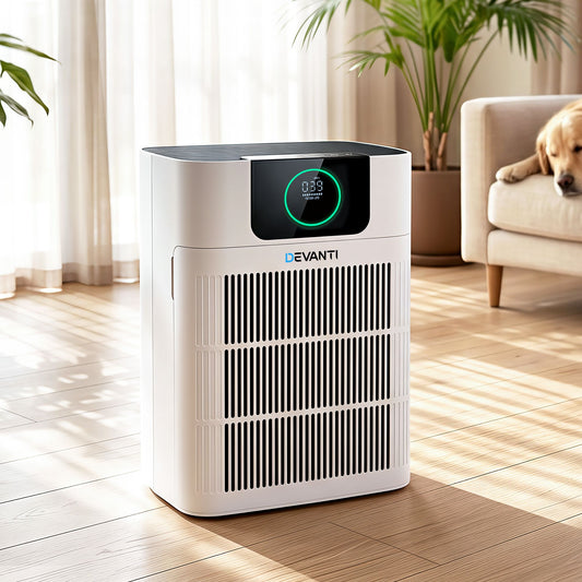White pet air purifier with PM2.5 display standing in a living room