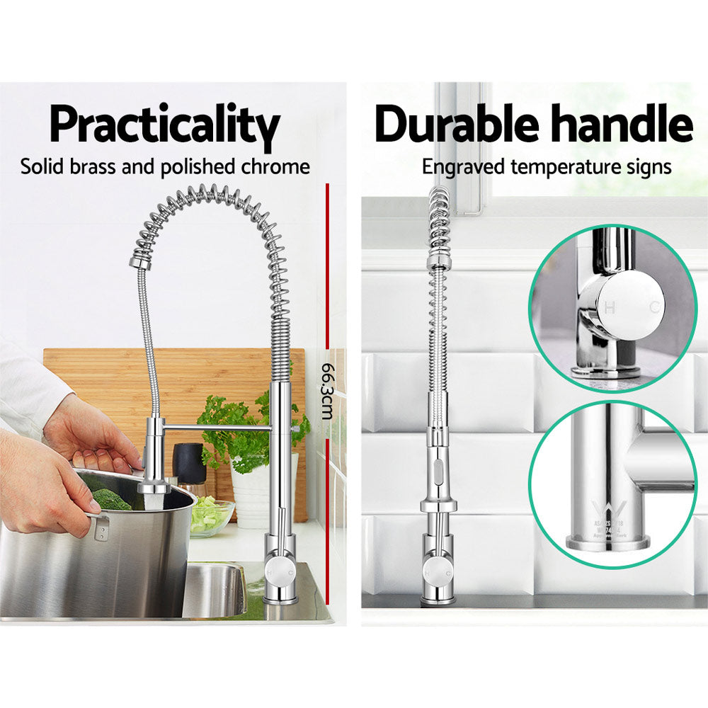 Polished chrome pull-down kitchen mixer tap over a stainless sink