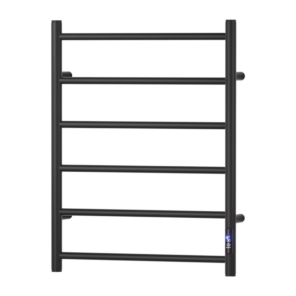 Black six bar wall mounted heated towel rail with towels hanging