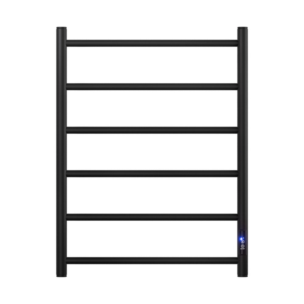 Black six bar wall mounted heated towel rail with towels hanging