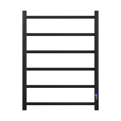 Black six bar wall mounted heated towel rail with towels hanging