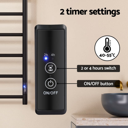 Black six bar wall mounted heated towel rail with towels hanging