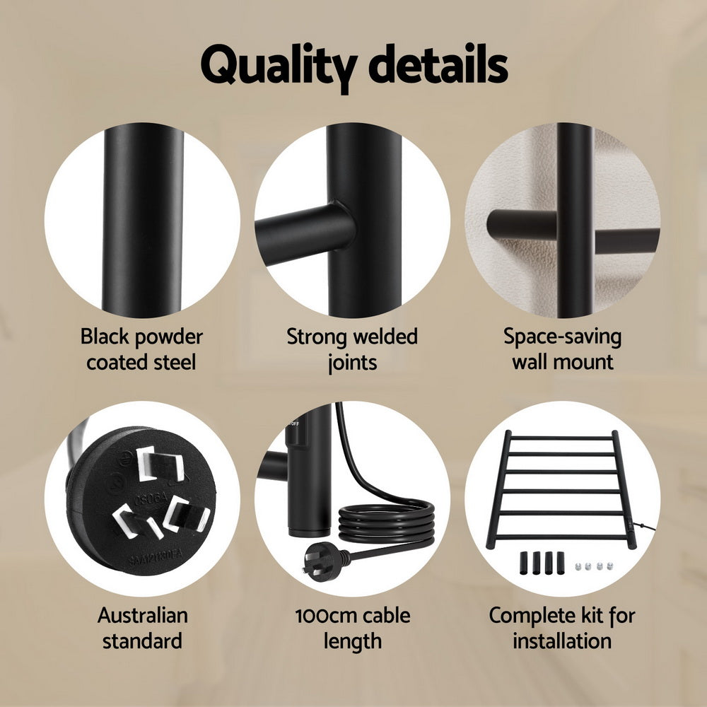 Black six bar wall mounted heated towel rail with towels hanging