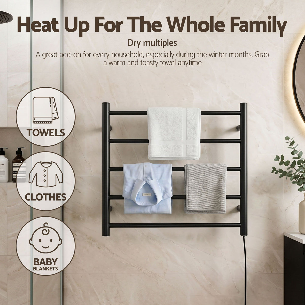 Black five bar wall mounted heated towel rail in a bathroom