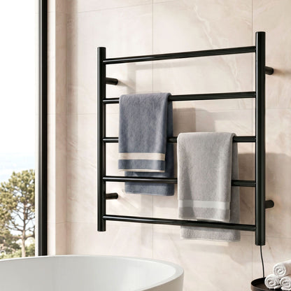 Black five bar wall mounted heated towel rail in a bathroom