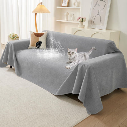 Light gray waterproof couch cover protector fitted over a three-cushion sofa