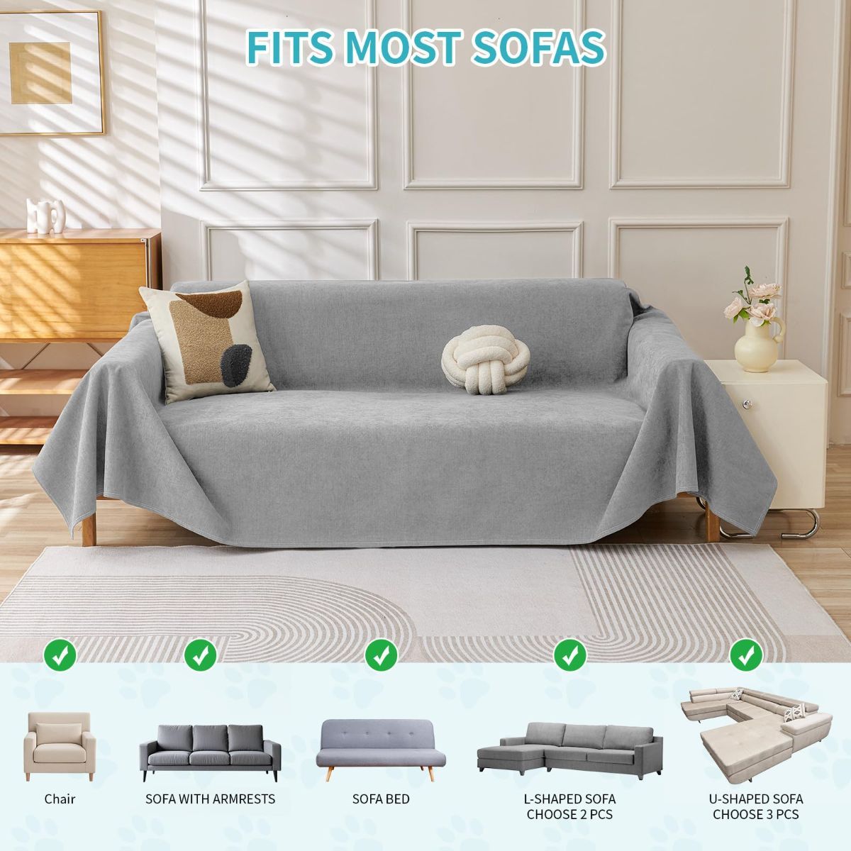Light gray waterproof couch cover protector fitted over a three-cushion sofa