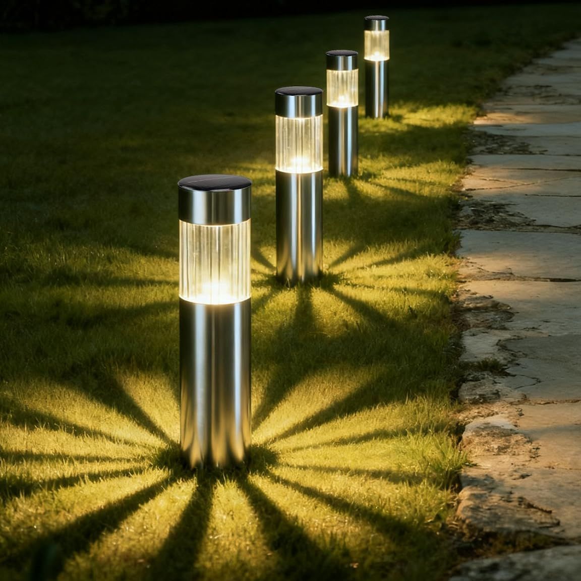 Four black solar stainless steel pathway lights for outdoor garden use