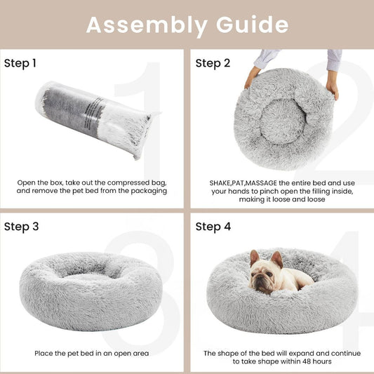 Grey round anti-anxiety donut pet bed with raised edges and plush faux fur