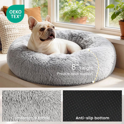Grey round anti-anxiety donut pet bed with raised edges and plush faux fur
