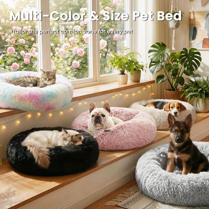 Grey round anti-anxiety donut pet bed with raised edges and plush faux fur