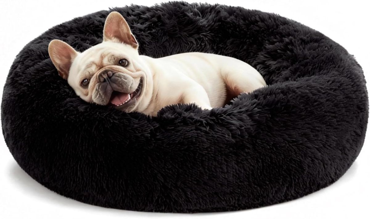 Grey round anti-anxiety donut pet bed with raised edges and plush faux fur