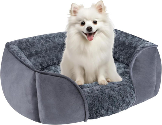 Dark gray washable orthopedic pet bed with raised pillow edges and removable sleeping mat