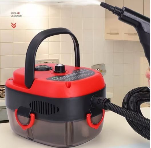 Red 2500W steam cleaner with brush heads for car and home cleaning