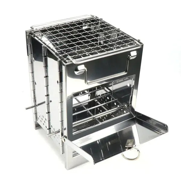 Folding stainless steel charcoal barbecue grill set up for cooking outdoors