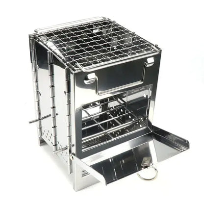 Folding stainless steel charcoal barbecue grill set up for cooking outdoors