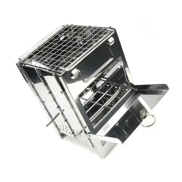 Folding stainless steel charcoal barbecue grill set up for cooking outdoors