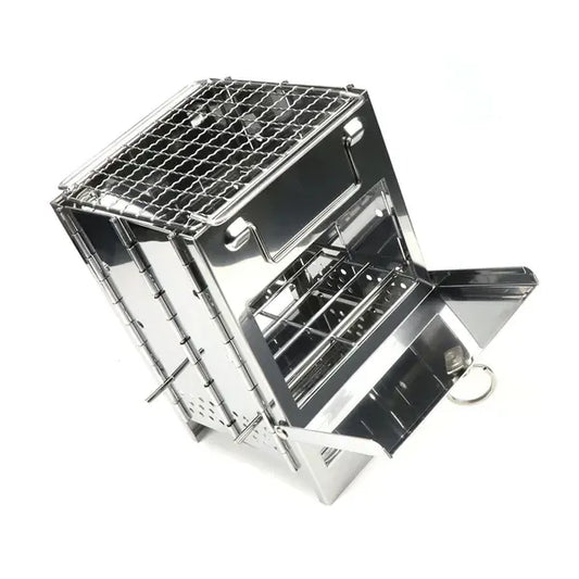 Folding stainless steel charcoal barbecue grill set up for cooking outdoors