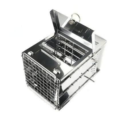 Folding stainless steel charcoal barbecue grill set up for cooking outdoors