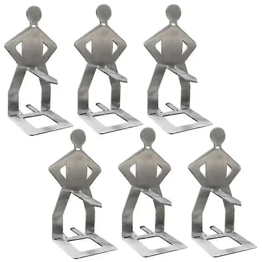 Six stainless steel standing sausage holders on a barbecue grill