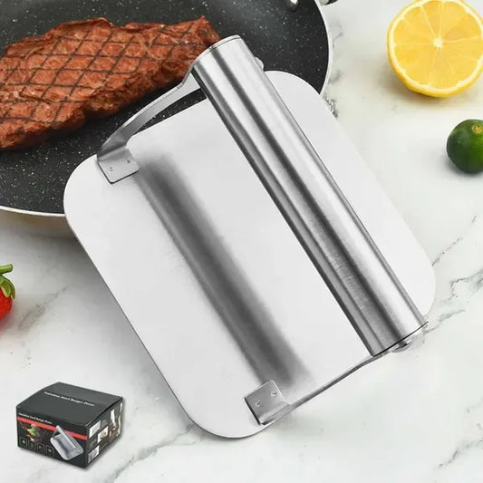 Square stainless steel burger press with round handle on a hot flat top