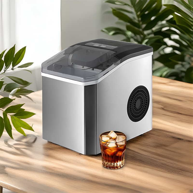 Portable countertop ice maker with carry handle, basket and scoop