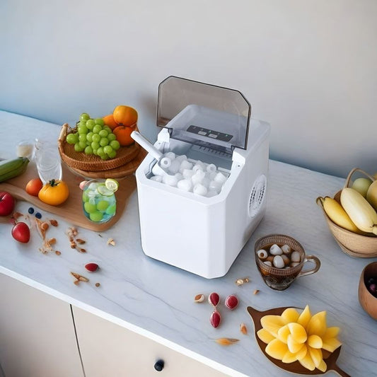 Portable countertop ice maker with carry handle, basket and scoop