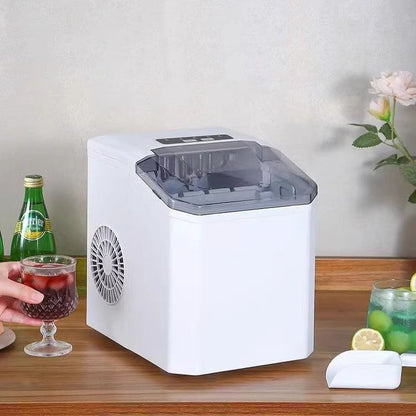 Portable countertop ice maker with carry handle, basket and scoop