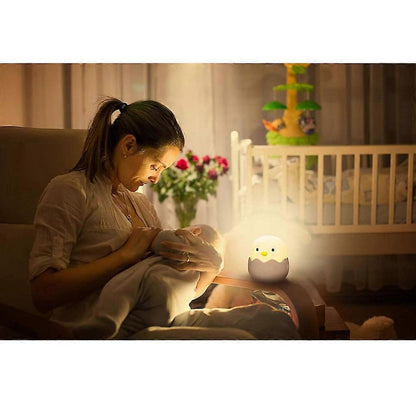Cute chick-shaped dimmable night light with warm yellow glow