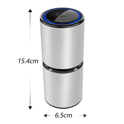 Compact portable air purifier standing on a bedside table