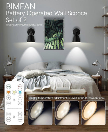 Pair of battery operated wall sconces lit on a wall with a remote control