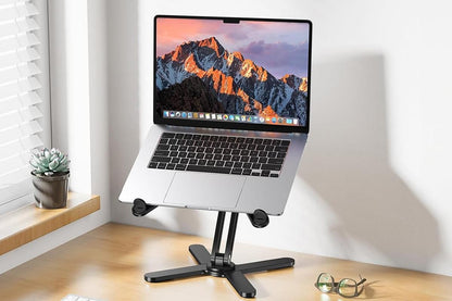Black aluminium laptop stand with rotating base and adjustable height