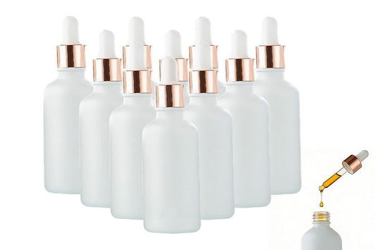 Pack of 10 matte white glass dropper bottles with rose gold caps