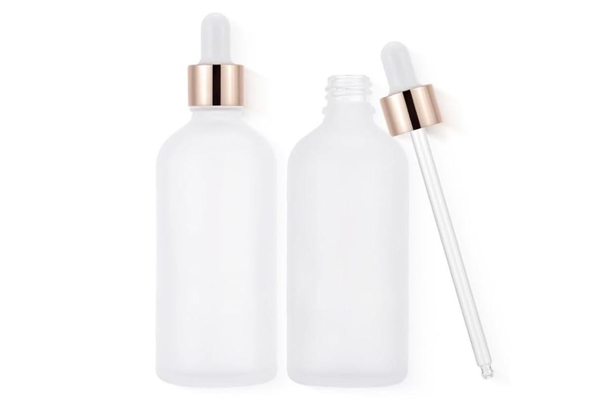 Pack of 10 matte white glass dropper bottles with rose gold caps