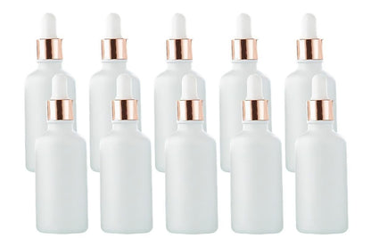 Pack of 10 matte white glass dropper bottles with rose gold caps